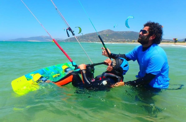 Experieced kitesurfing teacher in the water with you